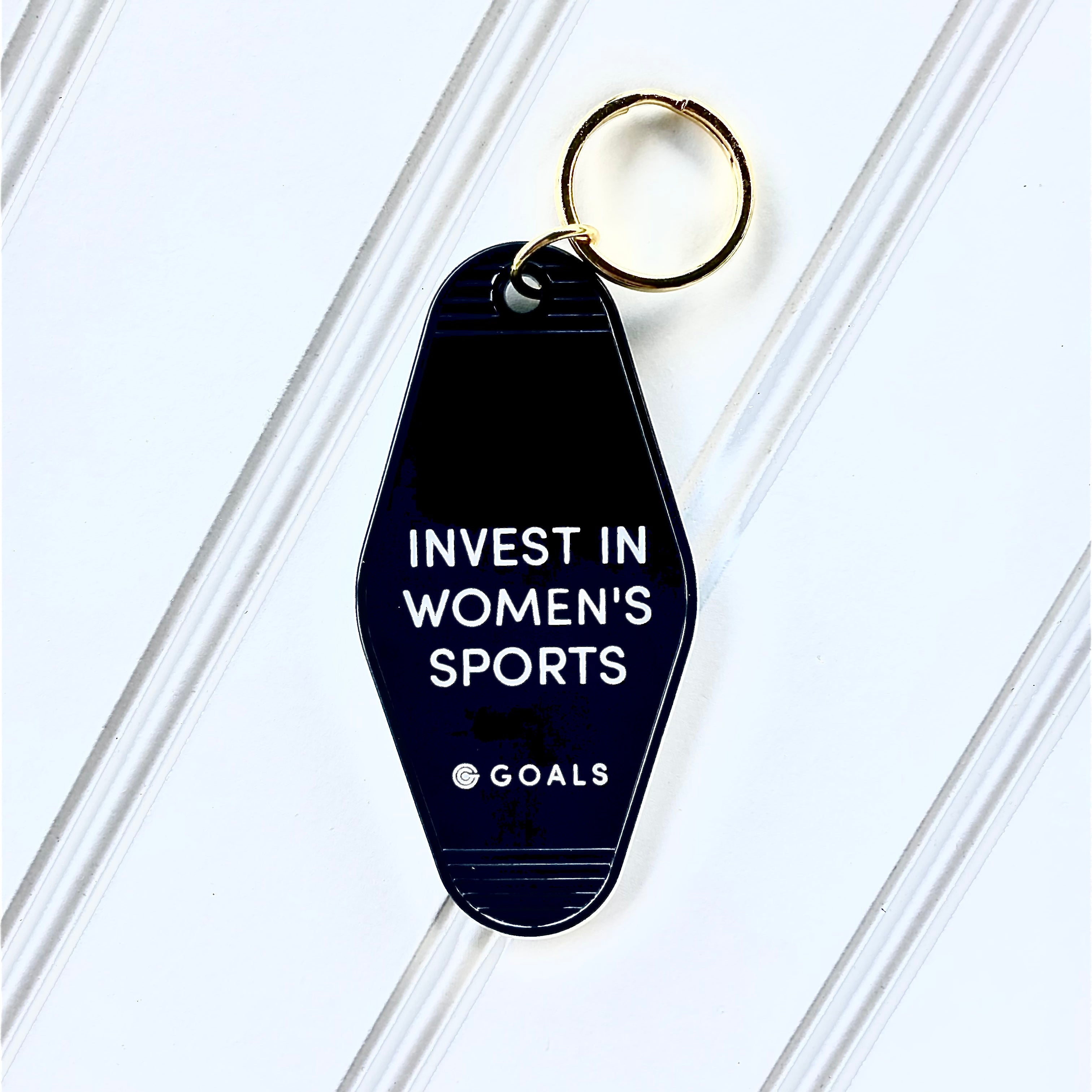 "Invest In Women's Sports" Motel Keychain